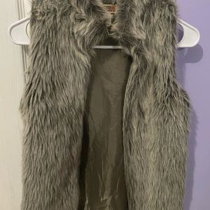 Grayish white fur vest